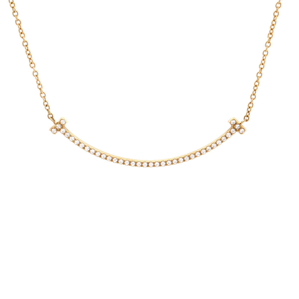 Tiffany & Co. Small T Smile Pendant Necklace 18K Yellow Gold and Diamonds